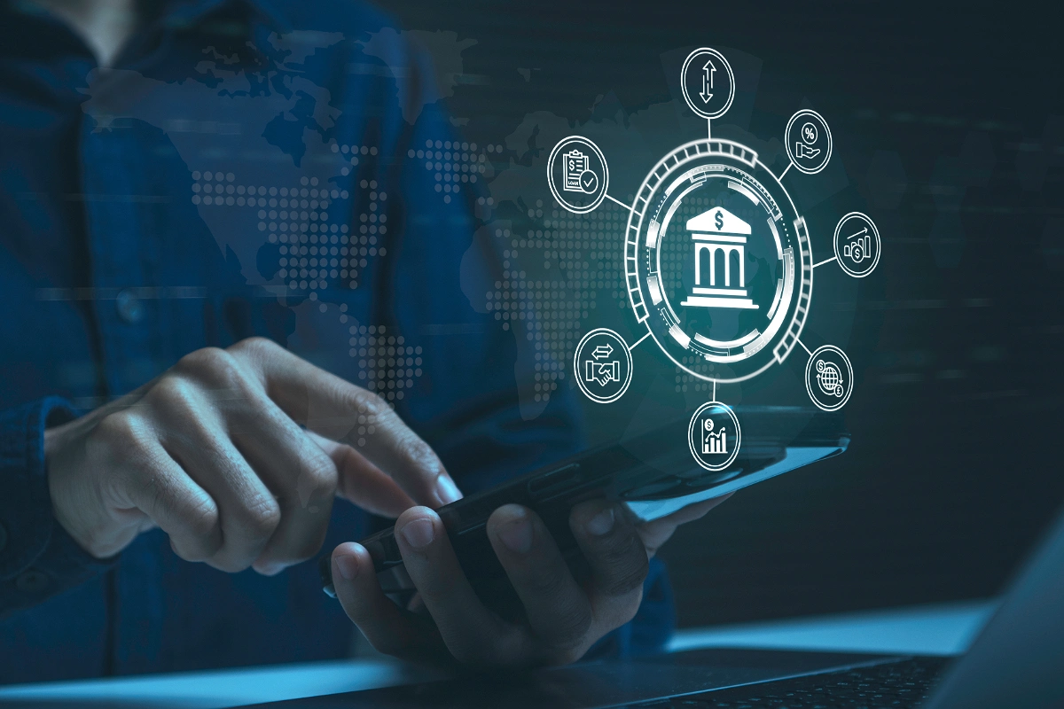 Person managing payments on a smartphone with digital banking graphics